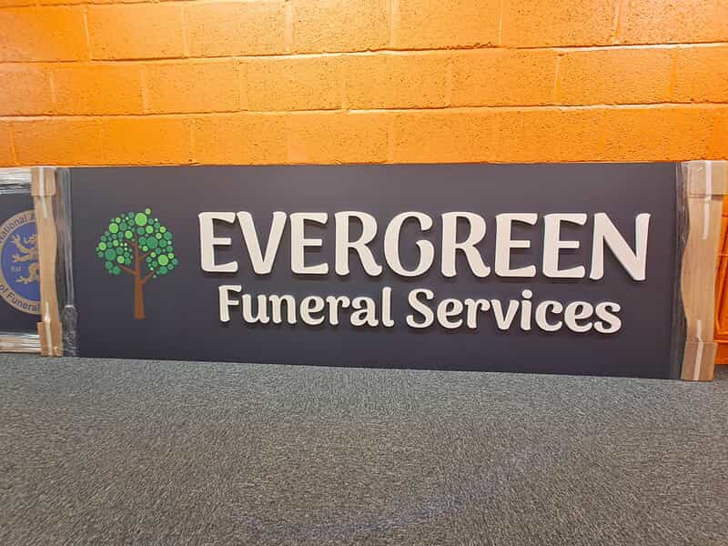 An image of the Evergreen Funeral Services building sign.